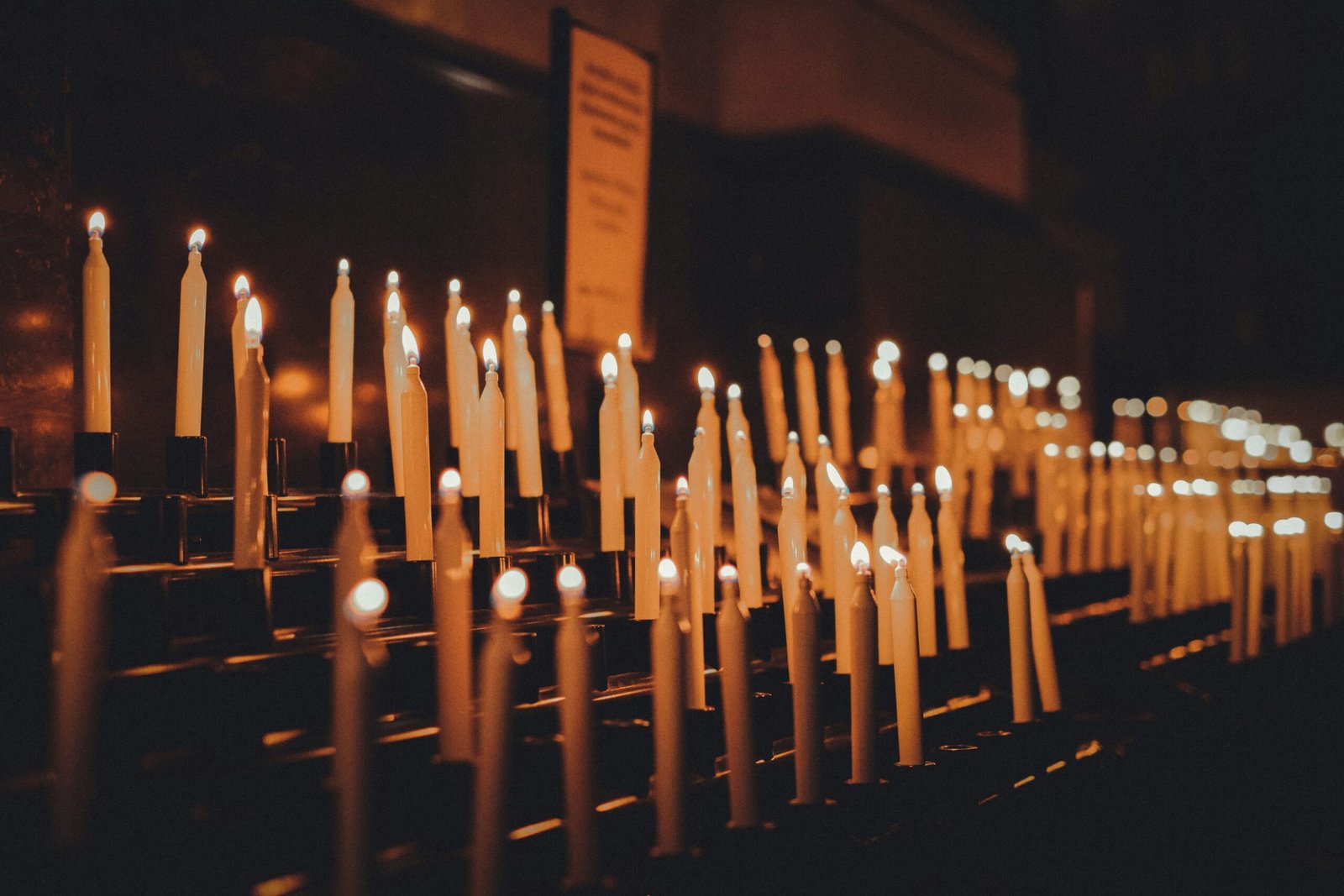 Church candles or a cross symbolizing All Saints’ Day