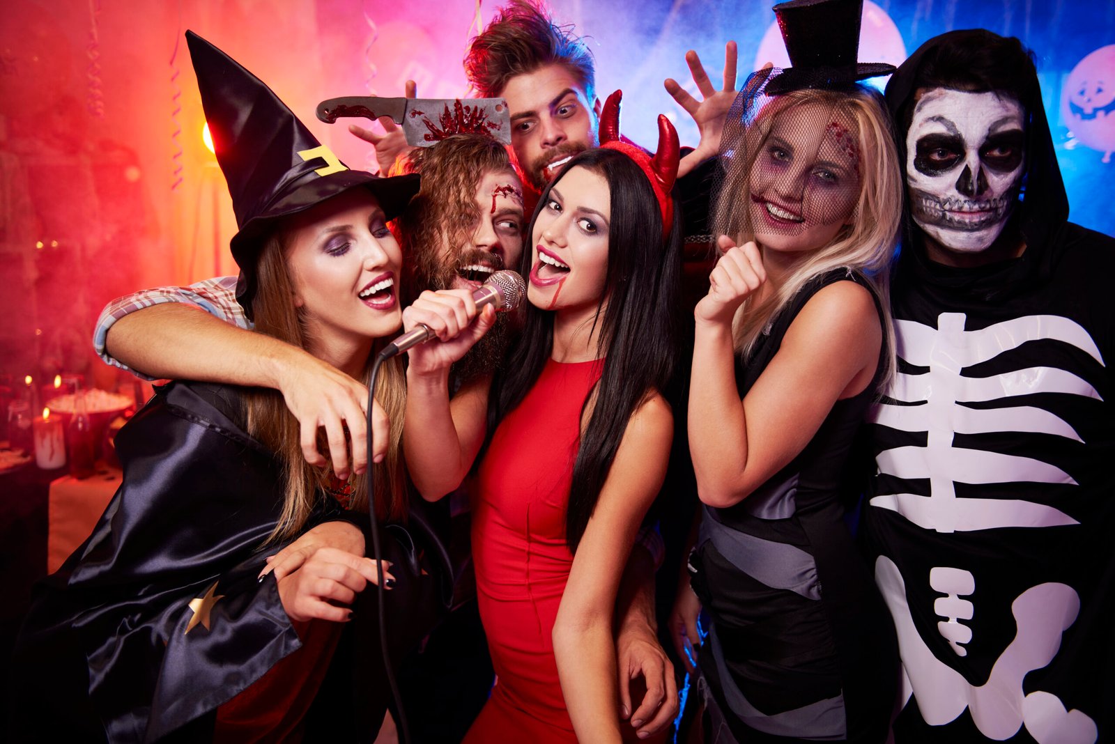 People at a Halloween parade or party